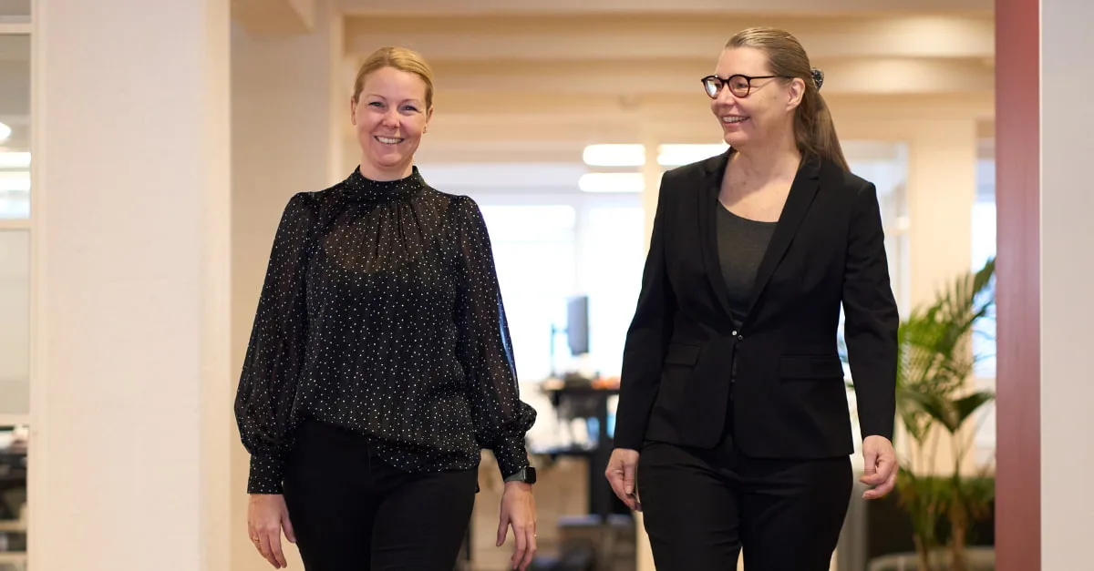 Two women dressed in black seen from the front at Process Factory